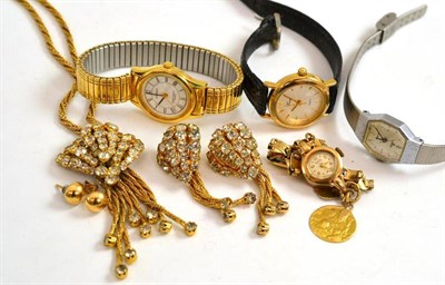 Lot 11 - A lady's 9ct gold Rotary wristwatch and two attached medals stamped 18k, three lady's wristwatches