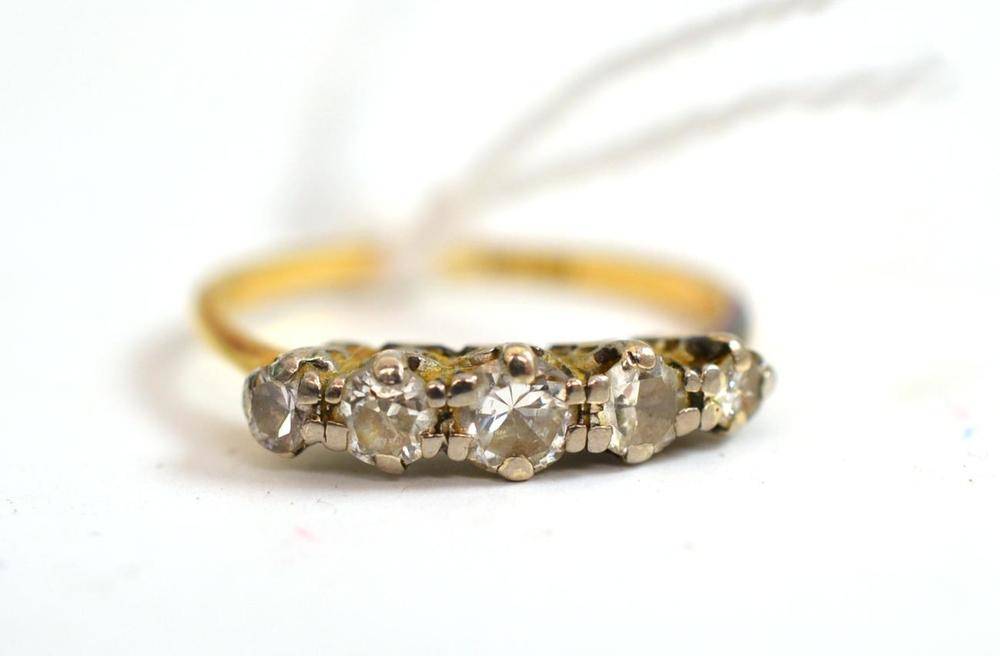Lot 13 - A diamond five stone ring