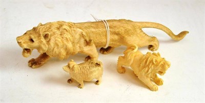Lot 17 - An early 20th century ivory lion and two small animal carvings (all 1930s)