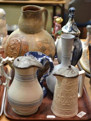 Lot 39 - Large stoneware jug impressed Guerin Belgium, tin glaze blue and white vase and cover,...