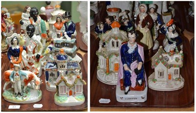 Lot 43 - Two trays of Staffordshire figures, pastille burners, spill vase and two Uncle Tom figures