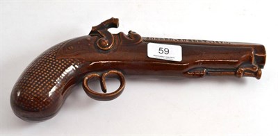 Lot 59 - A 19th century treacle glaze flask as a percussion pistol, impressed Joseph Turley 1870 (a.f.)