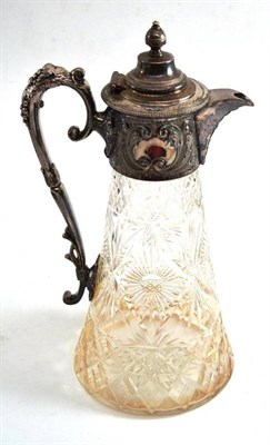 Lot 60 - A cut glass claret jug with silver plated mounts