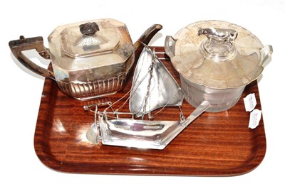 Lot 74 - A silver teapot, a William IV butter dish with cut glass bowl (badly damaged) with a silver...