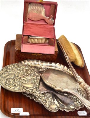 Lot 79 - A collection silver dressing table items including two cased sets of brushes, a silver tray...
