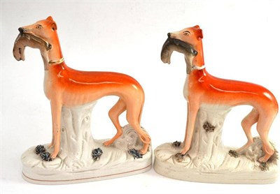 Lot 93 - Two Staffordshire greyhound figures