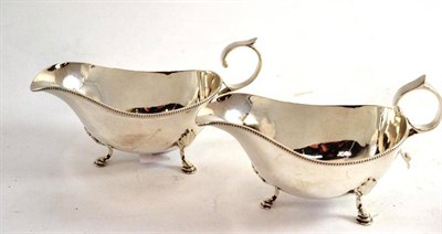 Lot 102 - A pair of silver sauce boats Sheffield Assay