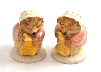 Lot 103 - Two Beswick Beatrix Potter figure 'Mrs. Tiggy-Winkle Buys Provisions', BP-11a (2)