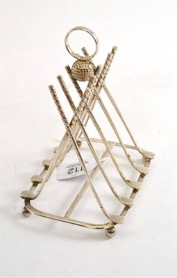 Lot 112 - A modern novelty golfing toast rack, maker's mark CBS, Birmingham 1993, with four divisions...