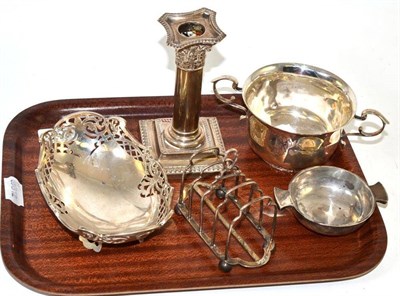 Lot 117 - A collection of silver including a twin-handled sugar bowl, a five-bar toast rack, a pierced...