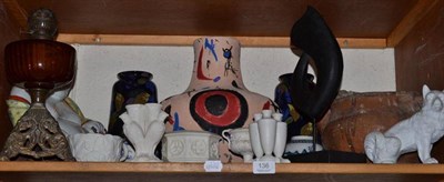 Lot 136 - A shelf of ceramics including an Art pottery vase, a pair of blue glaze vases, Parian ware, an...