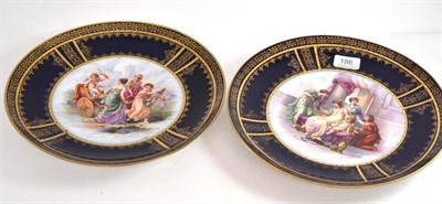 Lot 186 - A pair of Vienna style blue ground plaques decorated with classical figures