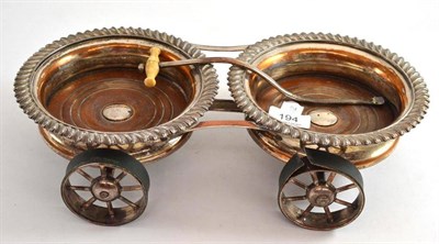 Lot 194 - A silver on copper two-bottle decanter carriage (a.f.)