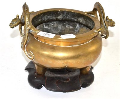 Lot 206 - Japanese bronze two handled koro and hardwood stand