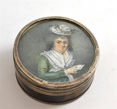 Lot 218 - A circular tortoiseshell box, the lid decorated with the portrait of a lady