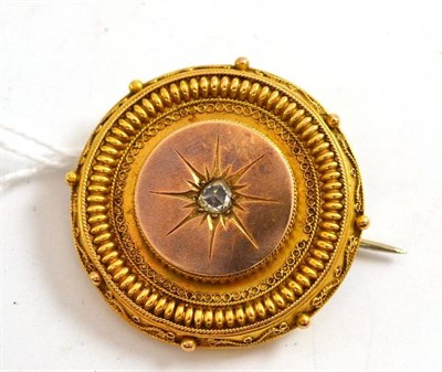 Lot 229 - A Victorian locket back brooch inset with a rose cut diamond