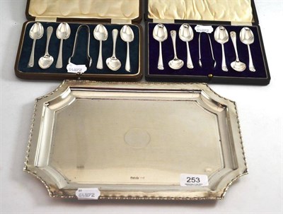 Lot 253 - Two cases of silver teaspoons with sugar tongs and a silver tray