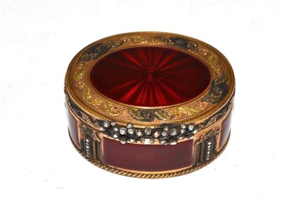 Lot 269 - An 18th century French gold snuff box with red enamel decoration and a paste set thumb piece