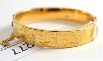 Lot 277 - A 9ct gold bangle