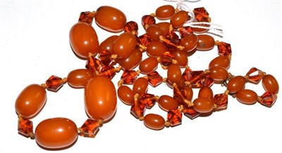 Lot 279 - An amber and glass necklace