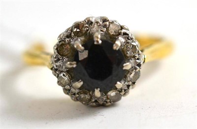 Lot 286 - An 18ct gold sapphire and diamond ring