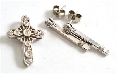 Lot 287 - A diamond cross stamped '14K' and a pair of diamond drop earrings, stamped '750'