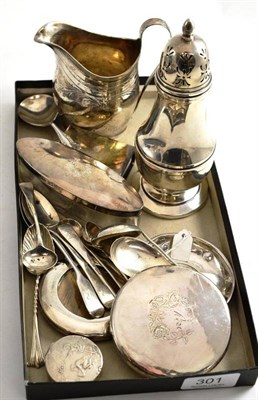 Lot 301 - A collection of silver including a sugar caster, two caddy spoons, assorted teaspoons, a George III