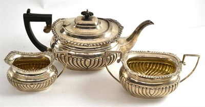 Lot 307 - A silver three piece tea service, Chester 1902