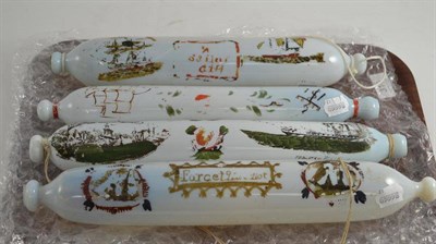 Lot 316 - Four 19th century opaque glass rolling pins, each painted with ships