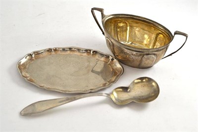 Lot 318 - A Continental white metal twin-handled sugar basin, a white metal dish and spoon