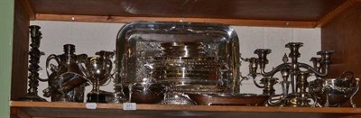 Lot 371 - A shelf of silver plate including candlesticks, trays, entree dishes etc