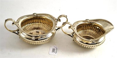 Lot 388 - A silver cream and sugar