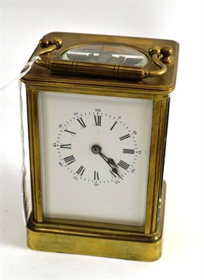 Lot 393 - A brass carriage clock