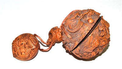 Lot 409 - A Japanese carved boxwood inro, netsuke and ojimo, all carved with dragons and signed