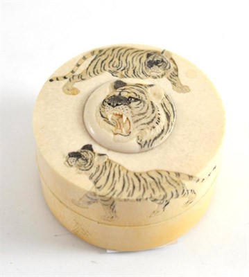 Lot 411 - Carved ivory box decorated with tigers