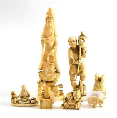 Lot 419 - Two late 19th/early 20th century Japanese ivory figures and five smaller figures