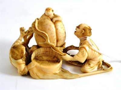 Lot 427 - Early 20th century Japanese ivory group of three figures