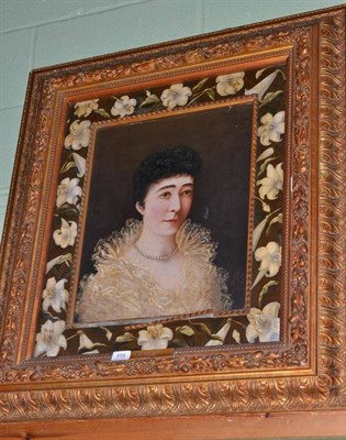 Lot 454 - A Victorian gilt framed oil on canvas portrait of a lady contained within a gilt and gesso...