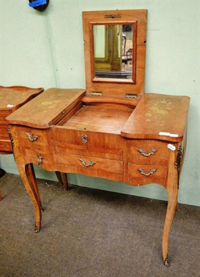 Lot 516 - French style marquetry decorated dressing table