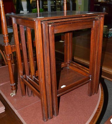 Lot 579 - A nest of three Edwardian small tables