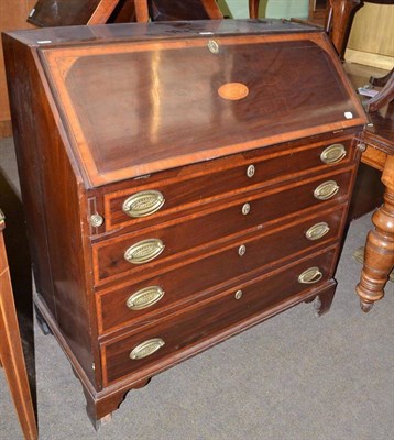 Lot 592 - A 19th century mahogany bureau cross-banded with satinwood