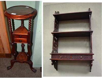 Lot 603 - Reproduction wig stand and hanging shelves