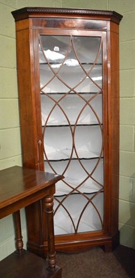 Lot 605 - 19th century mahogany corner cupboard with dentil cornice and glazed door