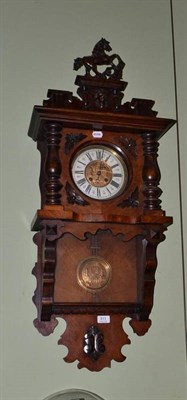 Lot 611 - Vienna type walnut wall clock