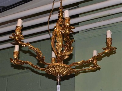 Lot 627 - A six branch ormolu chandelier