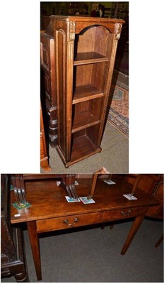 Lot 635 - A cherrywood side table with two drawers and a small bookcase