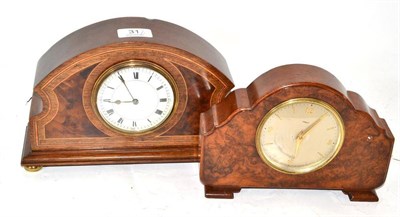 Lot 31 - An Edwardian inlaid mahogany small mantel timepiece and a walnut mantel timepiece (2)