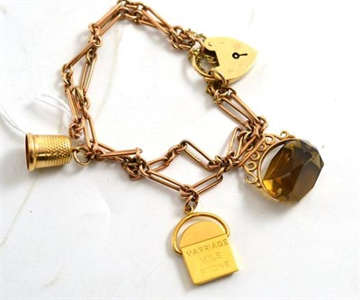 Lot 98 - A 9ct gold charm bracelet
