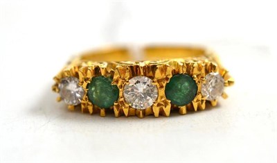 Lot 102 - A diamond and emerald five stone ring