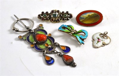 Lot 120 - Three enamel brooches, an enamel pendant and a garnet and emerald set brooch